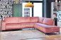 Preview: Ecksofa Mex in rosa Samtbezug mit schwarzen Metallfüßen. Erhältlich im Möbelhaus Die Wäscherei - Das Möbelhaus in Hamburg.