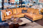 Preview: Ecksofa Shade in orange-goldenem Chenillebezug. Erhältlich im Möbelhaus Die Wäscherei - Das Möbelhaus in Hamburg.