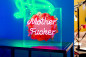Preview: Neon-Tischleuchte Mother F*cker in Rosa. Erhältlich im Möbelhaus Die Wäscherei - Das Möbelhaus in Hamburg.
